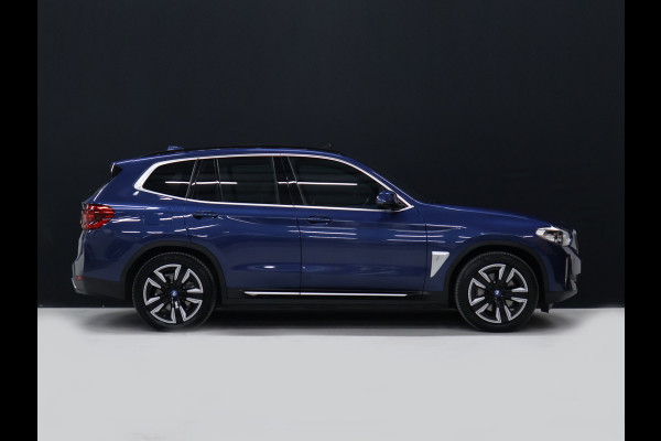 BMW iX3 Executive 80 kWh [SCHUIFKANTELDAK, ADAPTIVE CRUISE, MEMORY, APPLE CARPLAY, ANDROID, CAMERA, PDC, STOELVERWARMING, TREKHAAK, DRAADLOZE OPLADER, NIEUWSTAAT]