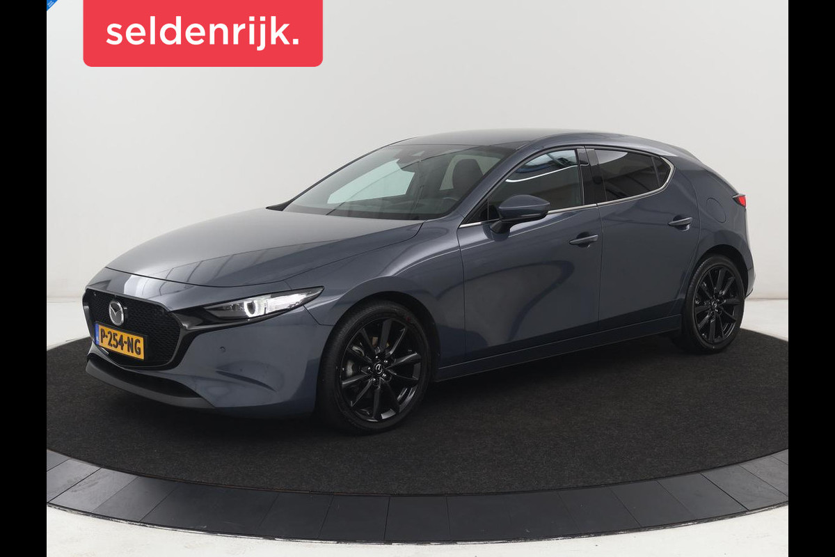 Mazda 3 2.0 e-SkyActiv-X M Hybrid 186 Luxury | Dieprood leder | 360 Camera | Head-Up | Stoelverwarming | Adaptive cruise | Memory | Carplay | Navigatie | Keyless | Full LED | Stuurverwarming