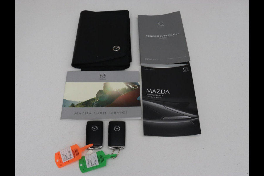 Mazda 3 2.0 e-SkyActiv-X M Hybrid 186 Luxury | Dieprood leder | 360 Camera | Head-Up | Stoelverwarming | Adaptive cruise | Memory | Carplay | Navigatie | Keyless | Full LED | Stuurverwarming