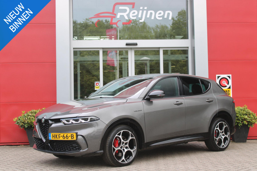 Alfa Romeo Tonale 1.5T Hybrid 160PK VELOCE | PREMIUM PACK: LEDEREN BEKLEDING/GEVENTILEERDE VOORSTOELEN/4-VOUDIG ELEKTRISCH VERSTELBARE LENDESTEUN VOORSTOELEN/ELEKTRISCH BEDIENBARE /HOOGGLANS ZWARTE RAAMOMLIJSTING/AMBIENT LIGHTING | TECHNOLOGY PACK: PARKEERWAARSCHUWING VOOR EN ACHTER/360° CAMERA/AUTOMATISCH INPARKEREN/ AUTONOMOUS DRIVING LEVEL 2: ADAPTIVE CRUISE CONTROL/LANE CENTERING ASSIST/TRAFFIC JAM ASSIST DODEHOEK DETECTIE AUTOMATISCH DIMMENDE BUITENSPIEGELS ELEKTRISCH BEDIENBARE ACHTERKLEP | WINTERPACK: STOELVERWARMING VOOR/STUURVERWARMING/VERWARMBARE RUITENSPROEIERS | 19" LICHTMET