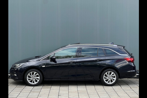 Opel Astra Sports Tourer BWJ 2018 | 1.0T 105PK Bus Executive | TREKHAAK | SCHUIF DAK | CLIMA | NAVI | PDC | CARPLAY | LICHTMETAAL |