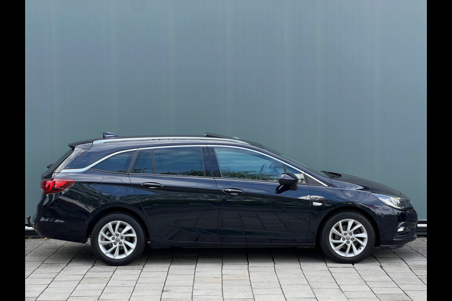 Opel Astra Sports Tourer BWJ 2018 | 1.0T 105PK Bus Executive | TREKHAAK | SCHUIF DAK | CLIMA | NAVI | PDC | CARPLAY | LICHTMETAAL |