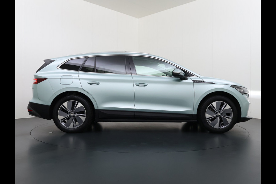 Škoda ENYAQ iV 80 SOH 90% Panoramadak 3-Zone Ecc Adap.Cruise Camera Navi Apple Carplay Android Auto Pdc Stoel+Stuurverwarming Lmv Led Privacy Glas Keyless advanced Dodehoek detectie File assistent Verkeersbord detectie 1e Eigenaar Dealeronderhouden Origineel Nederlandse Auto