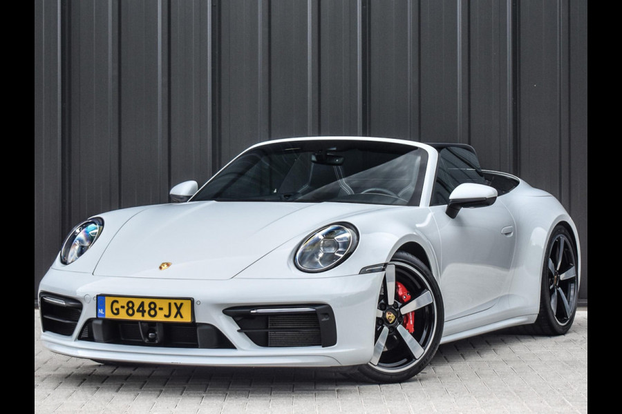 Porsche 911 Cabrio 3.0 Carrera 4 S NL-Auto 451pk | Sport design pack | Achteras besturing | Lift systeem | Sport chrono | 18-wegs memory seats | Burmester sound | Adaptive cruise | Carbon pack | Matrix led | 360 camera | Nw prijs 236.000