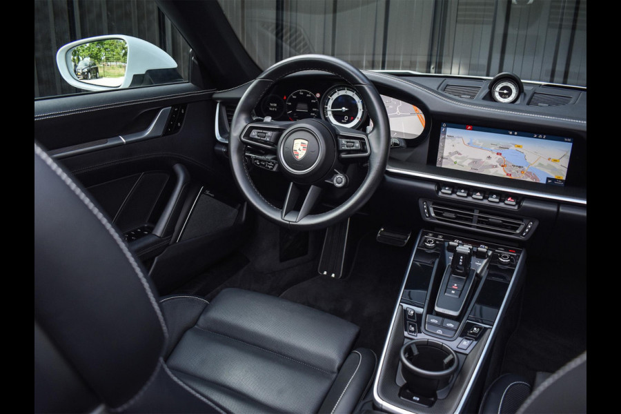Porsche 911 Cabrio 3.0 Carrera 4 S NL-Auto 451pk | Sport design pack | Achteras besturing | Lift systeem | Sport chrono | 18-wegs memory seats | Burmester sound | Adaptive cruise | Carbon pack | Matrix led | 360 camera | Nw prijs 236.000