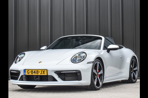 Porsche 911 Cabrio 3.0 Carrera 4 S NL-Auto 451pk | Sport design pack | Achteras besturing | Lift systeem | Sport chrono | 18-wegs memory seats | Burmester sound | Adaptive cruise | Carbon pack | Matrix led | 360 camera | Nw prijs 236.000
