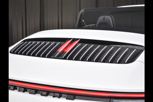 Porsche 911 Cabrio 3.0 Carrera 4 S NL-Auto 451pk | Sport design pack | Achteras besturing | Lift systeem | Sport chrono | 18-wegs memory seats | Burmester sound | Adaptive cruise | Carbon pack | Matrix led | 360 camera | Nw prijs 236.000