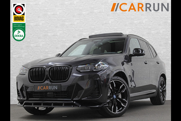 BMW iX3 M-Sport 80 kWh | 99% SOH | Panorama | ACC | 360 Camera | Harman-Kardon | Leder | Memory | Sfeerverlichting | Keyless-Entry | Head-Up | 3-Zone Clima | Stuurverwarming | Carplay | LED | Rijklaar incl. Bovag garantie