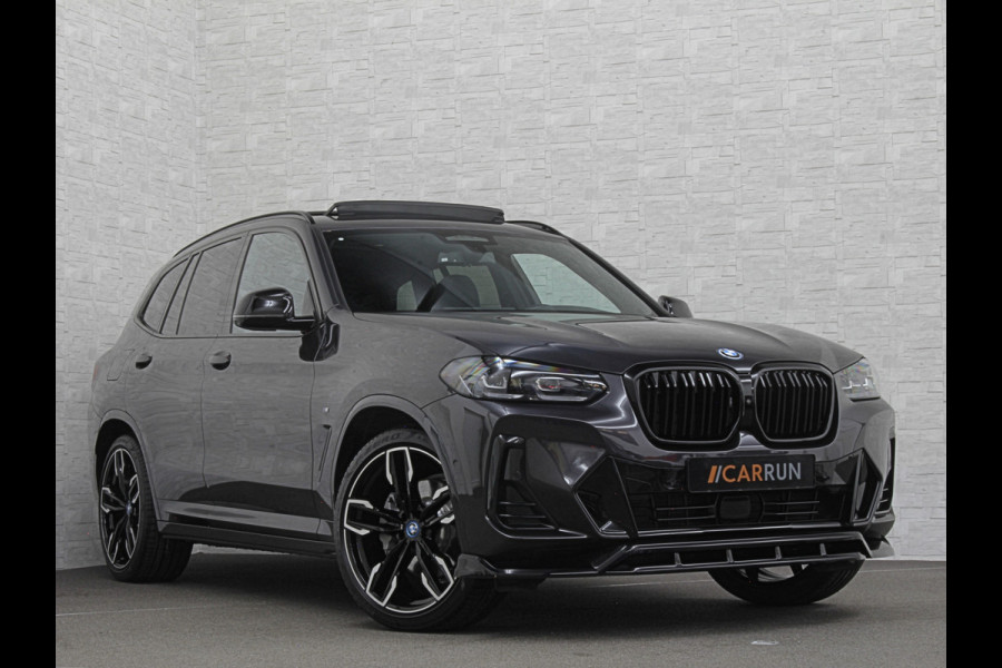 BMW iX3 M-Sport 80 kWh | 99% SOH | Panorama | ACC | 360 Camera | Harman-Kardon | Leder | Memory | Sfeerverlichting | Keyless-Entry | Head-Up | 3-Zone Clima | Stuurverwarming | Carplay | LED | Rijklaar incl. Bovag garantie
