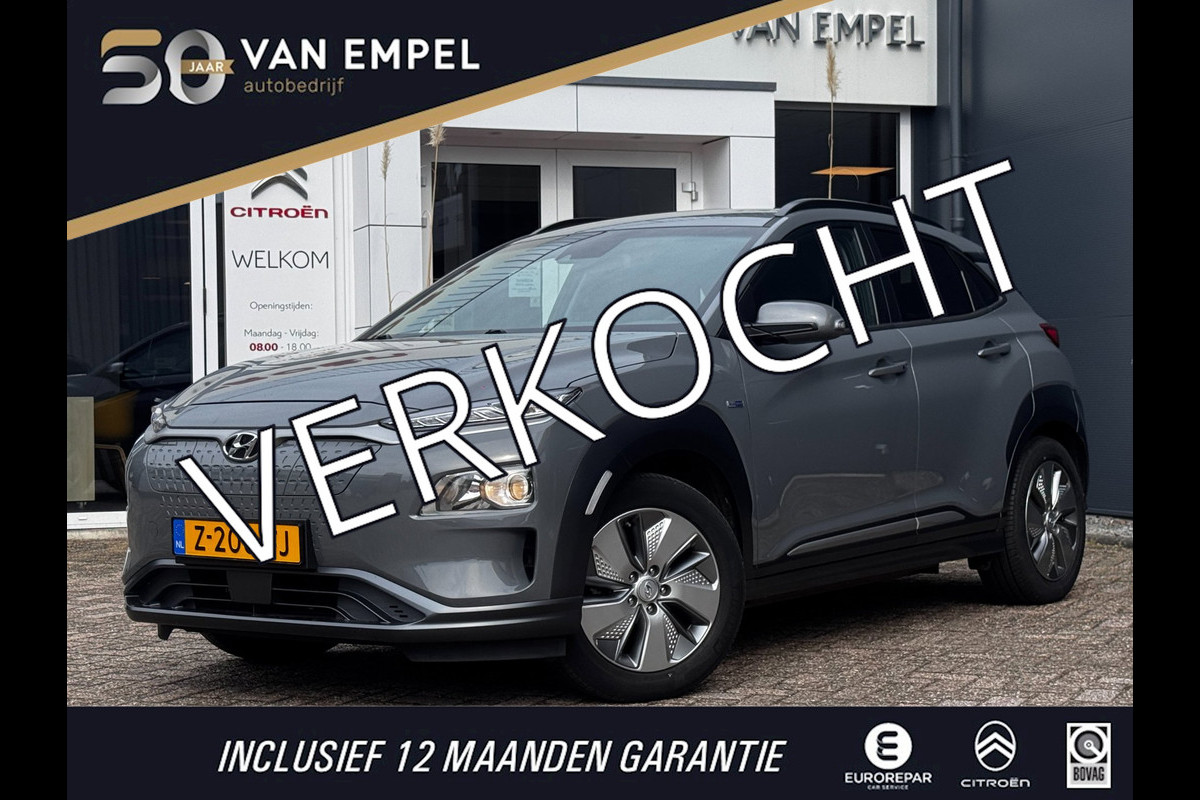 Hyundai Kona EV Comfort Smart 39 kWh | 100% SOH | Trekhaak | Camera | Stoel + Stuurverwarming | Navigatie