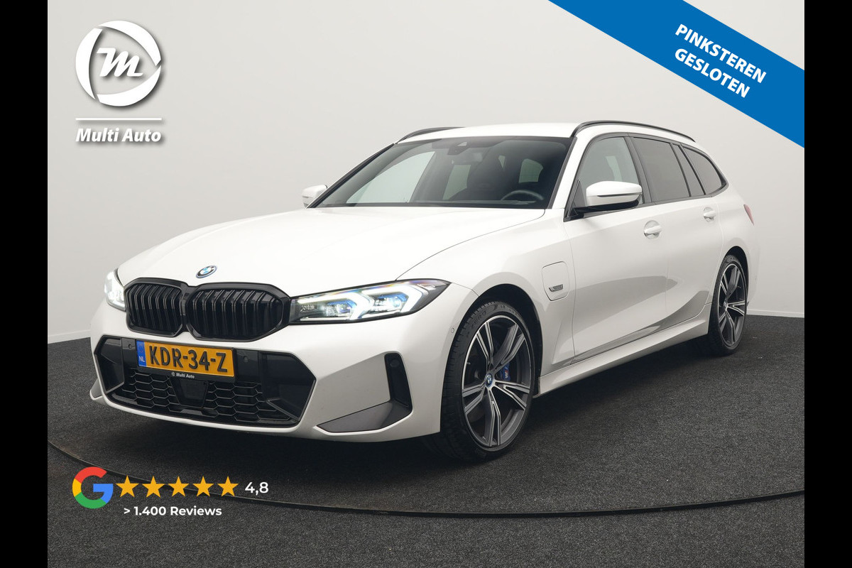 BMW 3 Serie Touring 330e M Sport PHEV 293pk Dealer O.H. NIEUW MODEL | Adaptive Cruise | Head Up | Camera | Lederen Competition Stoelen Memory & Verwarmd | Sfeerverlichting | Stuur Verwarmd | Keyless | Blis | Apple Carplay | Plug In Hybrid |