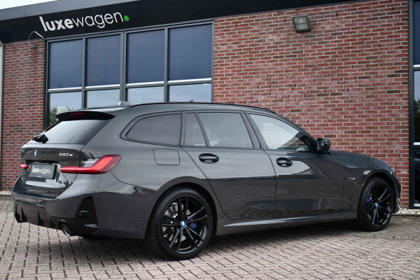 BMW 3 Serie Touring 330e M-Sport Pano ACC H/K El-zetels HUD Dravitgrau 19inch