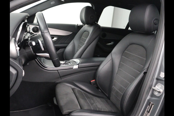 Mercedes-Benz C-Klasse 160 AMG Limited | Stoelverwarming | Leder/Alcantara | Trekhaak | Camera | Park Assist | Navigatie | Digitale Cockpit | Climate control | Cruise control | 18'' | Bluetooth