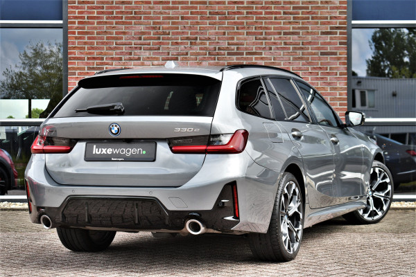 BMW 3 Serie Touring 330e xDrive M-Sport Pano 19inch El-zetels HUD 360-cam LCI-2