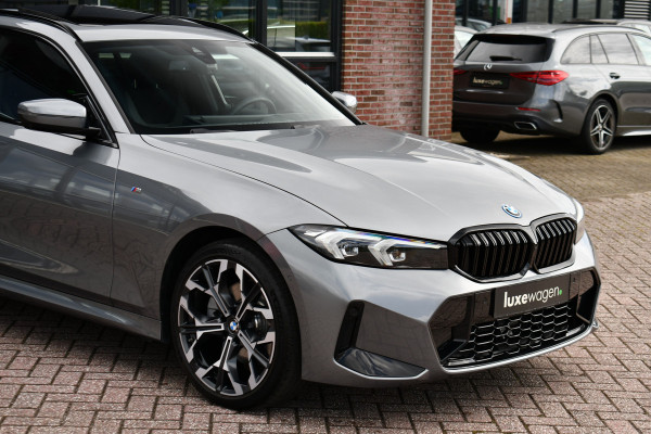 BMW 3 Serie Touring 330e xDrive M-Sport Pano 19inch El-zetels HUD 360-cam LCI-2