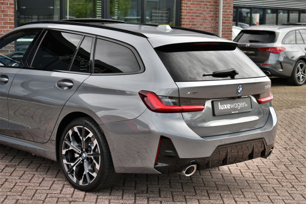 BMW 3 Serie Touring 330e xDrive M-Sport Pano 19inch El-zetels HUD 360-cam LCI-2