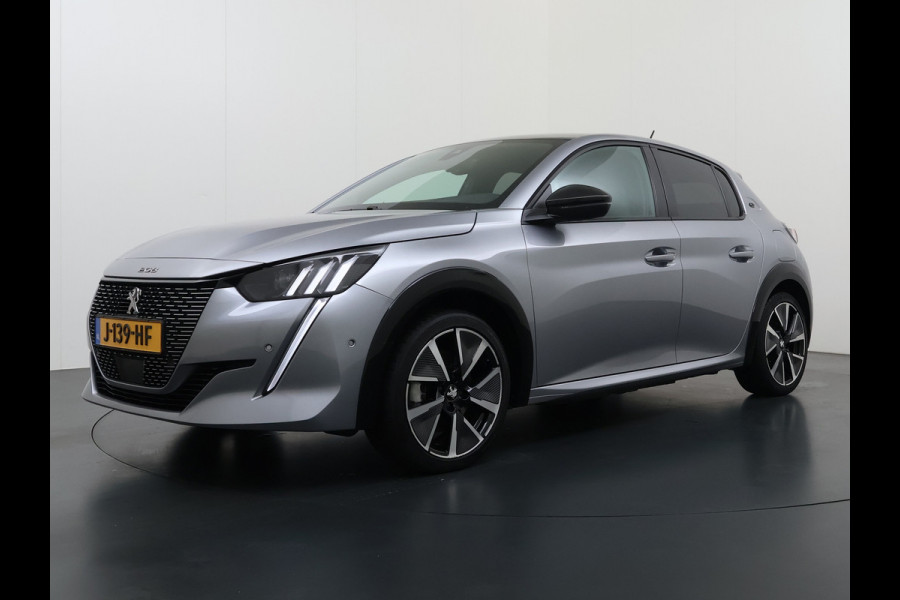 Peugeot e-208 EV GT 350 50 kWh SOH 89% Adap.Cruise 3D-Navi Stoelverwarming 360°Camera Apple Carplay Android Auto Ecc Pdc Privacy Glas Led Isofix DAB Lane Assist Keyless DAB+ 1e Eigenaar Dealeronderhouden Origineel Nederlandse Auto