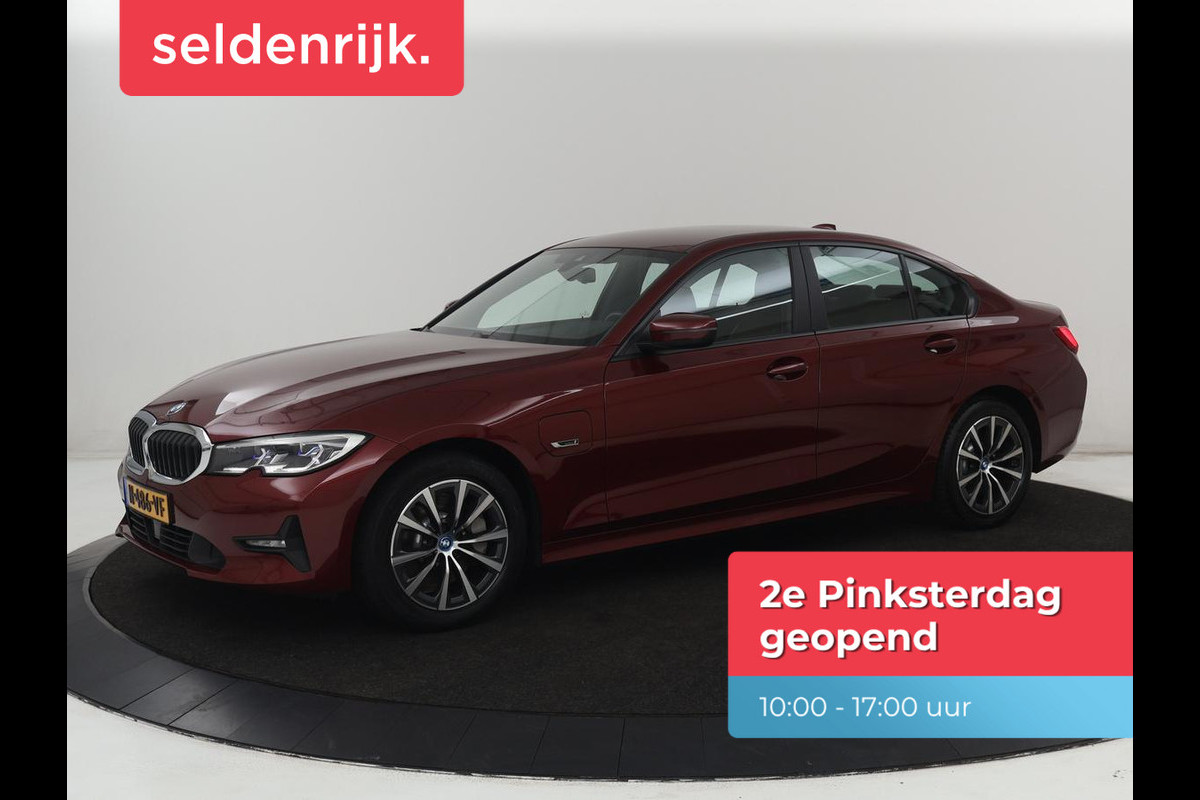 BMW 3-serie 330e Business Edition Plus | Sportstoelen | Leder | Adaptive cruise | Stoelverwarming | Carplay | Stuurverwarming | Navigatie | Parkeerhulp | Full LED | Live Cockpit | Individual Aventurinrot metallic | PHEV | Plug In