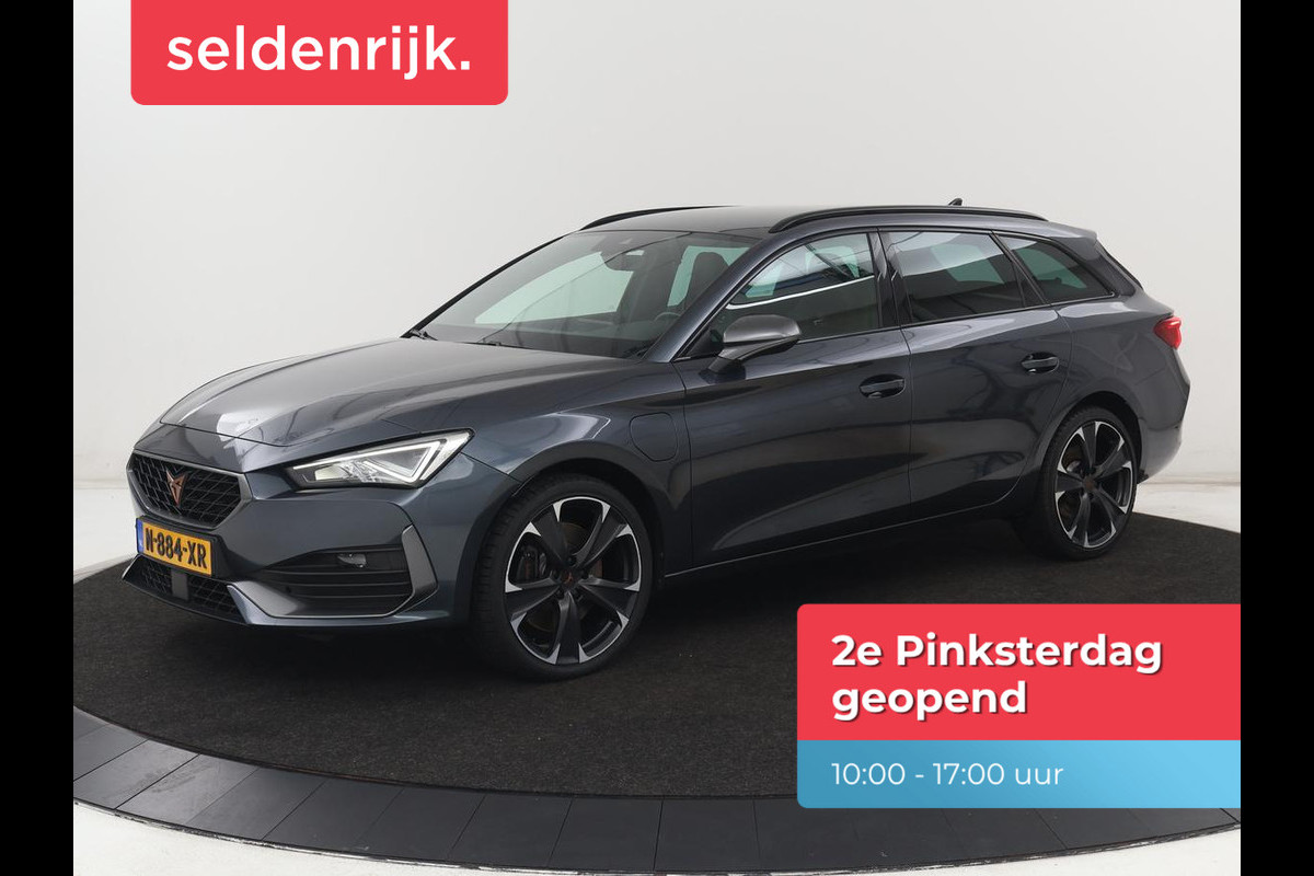CUPRA Leon 1.4 e-Hybrid VZ Business | 245pk | SOH 92% | Trekhaak | Carplay | Adaptive cruise | Sportstoelen | Navigatie | Stuurverwarming | Parkeerhulp | Full LED | Sfeerverlichting | Keyless | PHEV | Plug In