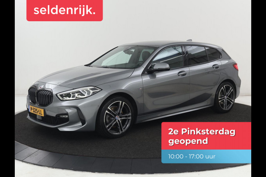 BMW 1-serie 118i M Sport | Carplay | Sportstoelen | Camera | Half leder | Navigatie | Live Cockpit | Park Assist | Full LED | Climate control | Sfeerverlichting | Cruise control | Bluetooth