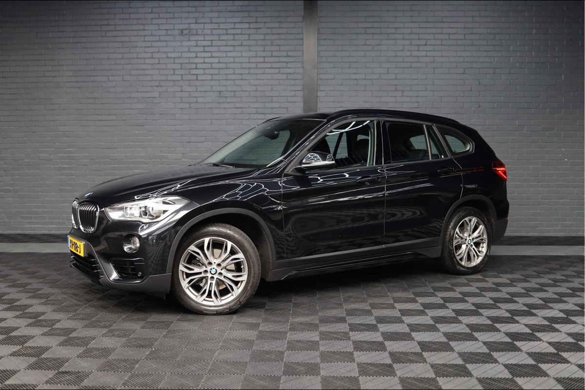 BMW X1 sDrive18i Executive Edition | NAP | PANORAMADAK | TREKHAAK | HUD | HOGE INSTAP |