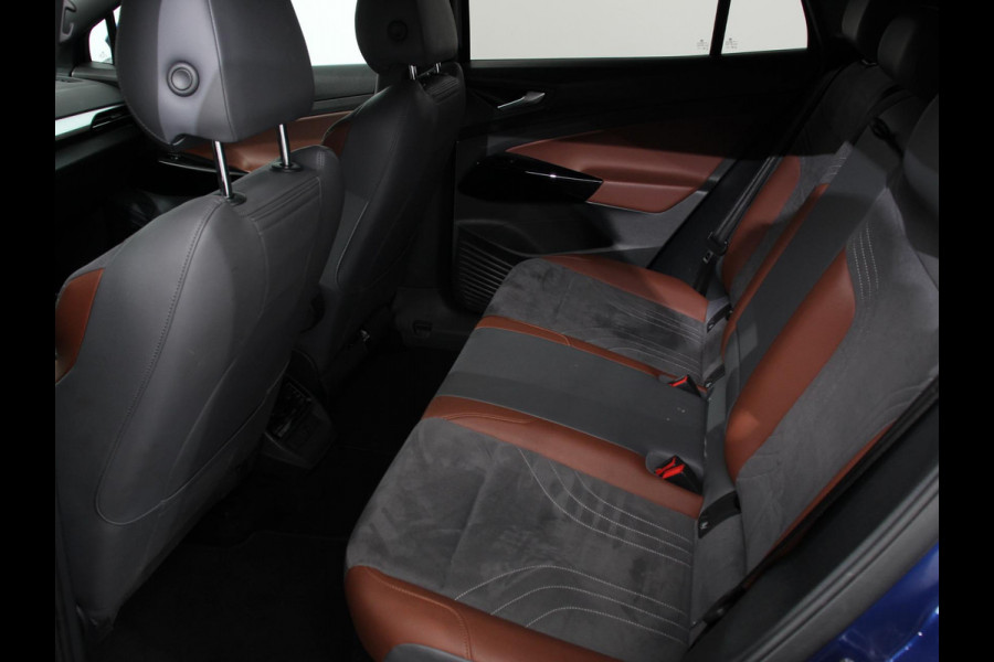 Volkswagen ID.4 Business 77 kWh SOH 83% Leder Navigatie 19" Lichtmetalen Velgen Apple Carplay/Android Auto Climate Control Warmtepomp Stoelverwarming Led Parkeer sensoren