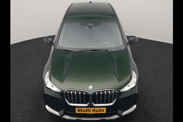 BMW iX1 xDrive30 xLine 67 kWh 306pk Dealer O.H. | Trekhaak Af Fabriek | Camera | Adaptief Onderstel | Lederen Sportstoelen Memory & Verwarmd | Sfeerverlichting | Apple Carplay | Blis | Navigatie | DAB | Virtual | Cruise Control |