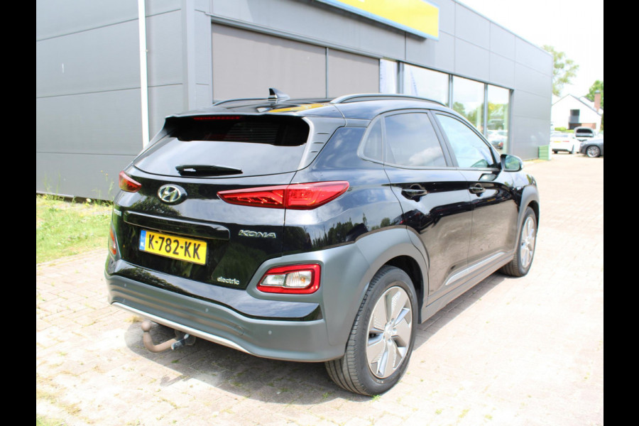 Hyundai Kona EV Premium 64 kWh | Trekhaak | Leder | Stoelverwarming/Koeling | Krell |