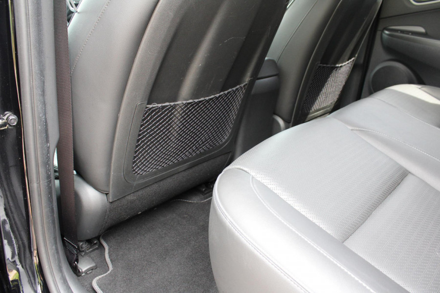 Hyundai Kona EV Premium 64 kWh | Trekhaak | Leder | Stoelverwarming/Koeling | Krell |