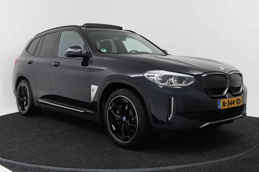 BMW iX3 High Executive 80 kWh M-pakket (1e eigenaar, NL-auto, Dealer OnderH, Panoramadak, Navi Pro, Leder, StoelV, Etc)