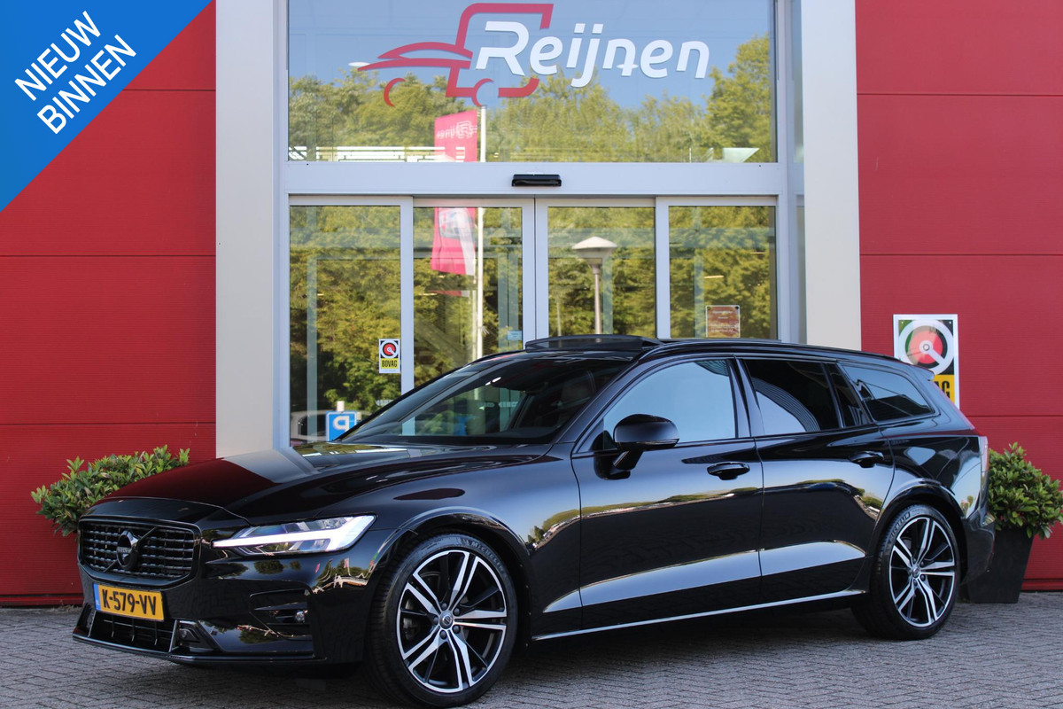 Volvo V60 2.0 B4 211PK R-DESIGN AUTOMAAT 8 PANORAMISCH SCHUIF/KANTELDAK | PARKEERVERWARMING MET TIMER (STANDKACHEL) | PREMIUM AUDIO BY HARMAN KARDON | 19" 5-TRIPPLE SPAAKS BLACK/DIAMAND CUT LICHTMETALEN VELGEN | BLINDSPOT INFOMATION SYSTEM "BLIS" (DODEHOEKDETECTIE) | VISUAL PARK ASSIST - CAMERA EN PARKEERHULP VOOR + ACHTER INCL. 360 GRADEN VIEW | VERWARMDE AQUABLADE RUITENWISSERBLADEN | PILOT ASSIST | APPLE CARPLAY / ANDROID AUTO | ADAPTIEVE CRUISECONTROL | R-DESIGN BEKLEDING MET NAPPA LEDER I.C.M. OPEN GRID TEXTIEL | ELEKTRISCH VERSTELBARE CONTOUR STOELEN (SPORTSTOELEN) MET GEH
