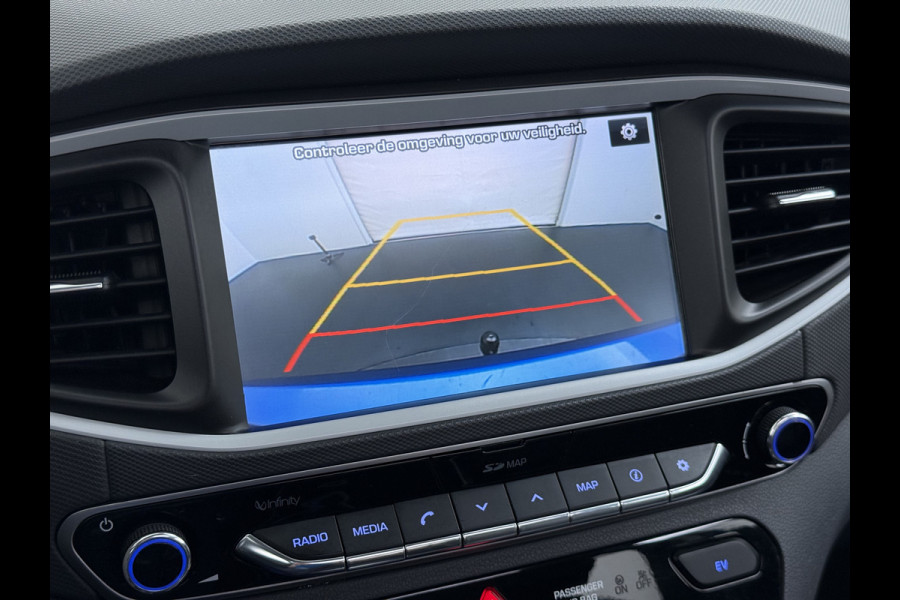 Hyundai IONIQ Premium EV SOH 99,9% Panorama-Schuifdak Adap.Cruise Leder+Memory Navi Ecc Trekhaak Infinity®-Audio Camera Apple Carplay Android  Stoel+Stuurverwarming Elek.Stoelen Lmv Bluetooth Dodehoek+Lane Assist VESS Origineel Nederlandse Auto