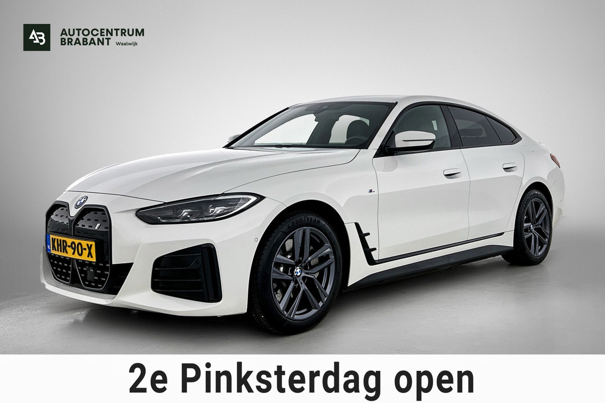 BMW i4 EDrive35 70 kWh M-sportpakket (1e Eig, Dealer OnderH, Navi Pro, Camera, Carplay, Addapt Cruise, StoelV, PDC V+A, Etc)
