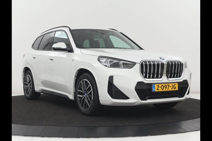 BMW X1 xDrive25e M Sport | SOH 93,3% | Adaptive cruise | Massage | Sportstoelen | Keyless | Stuurverwarming | Leder/Alcantara | Live Cockpit | Camera | Stoelverwarming | Adaptief LED | PHEV | Plug In