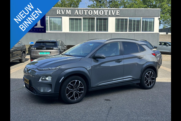 Hyundai Kona EV Premium 64 kWh SOH 97% | 12 MND BOVAG GARANTIE | STOEL/STUURVERWARMING | ELEK. STOELEN | DODEHOEK | KEYLESS | ACHTERUITRIJ CAMERA | HEAD UP | ADAP. CRUISE |