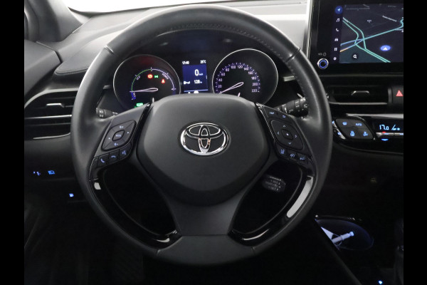 Toyota C-HR 1.8 HYBRID BI-TONE LUXERY LINE GARANTIE 5-2032 TREKHAAK. 4 SEIZOENEN BANDEN.NAVIGATIE. STUUR EN STOELVERWARMING. HALF LEDER