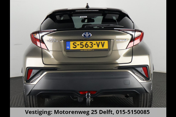 Toyota C-HR 1.8 HYBRID BI-TONE LUXERY LINE GARANTIE 5-2032 TREKHAAK. 4 SEIZOENEN BANDEN.NAVIGATIE. STUUR EN STOELVERWARMING. HALF LEDER