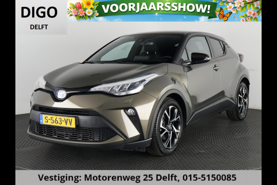 Toyota C-HR 1.8 HYBRID BI-TONE LUXERY LINE GARANTIE 5-2032 TREKHAAK. 4 SEIZOENEN BANDEN.NAVIGATIE. STUUR EN STOELVERWARMING. HALF LEDER