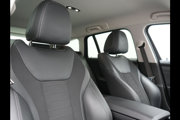 BMW 3 Serie Touring 330e Sport Line PHEV 293pk Dealer O.H. DRAVITGRAU | Trekhaak Af Fabriek | Adaptive Cruise | 360 Camera | Lederen Sportstoelen Memory & Verwarmd | Sfeerverlichting | Stuur Verwarmd | Apple Carplay | Navigatie | DAB | Plug In Hybrid |