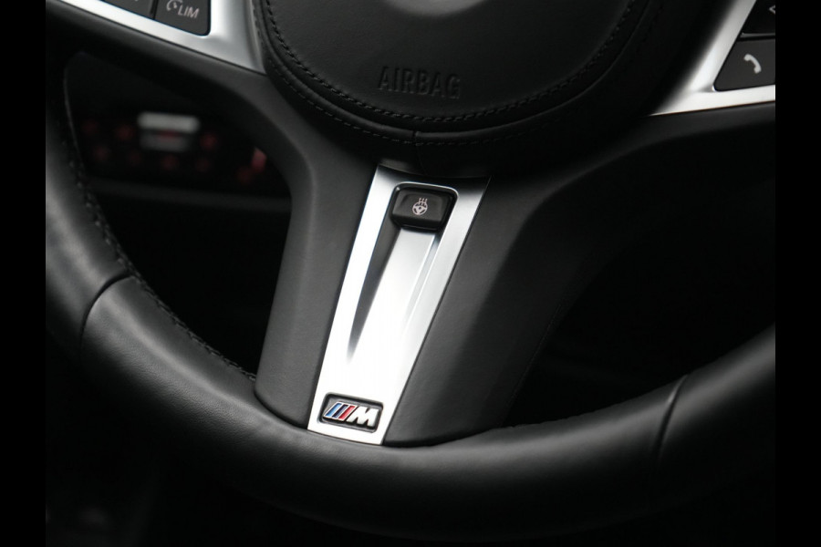 BMW 3 Serie Touring 330e Sport Line PHEV 293pk Dealer O.H. DRAVITGRAU | Trekhaak Af Fabriek | Adaptive Cruise | 360 Camera | Lederen Sportstoelen Memory & Verwarmd | Sfeerverlichting | Stuur Verwarmd | Apple Carplay | Navigatie | DAB | Plug In Hybrid |