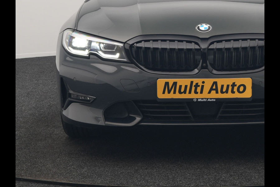 BMW 3 Serie Touring 330e Sport Line PHEV 293pk Dealer O.H. DRAVITGRAU | Trekhaak Af Fabriek | Adaptive Cruise | 360 Camera | Lederen Sportstoelen Memory & Verwarmd | Sfeerverlichting | Stuur Verwarmd | Apple Carplay | Navigatie | DAB | Plug In Hybrid |