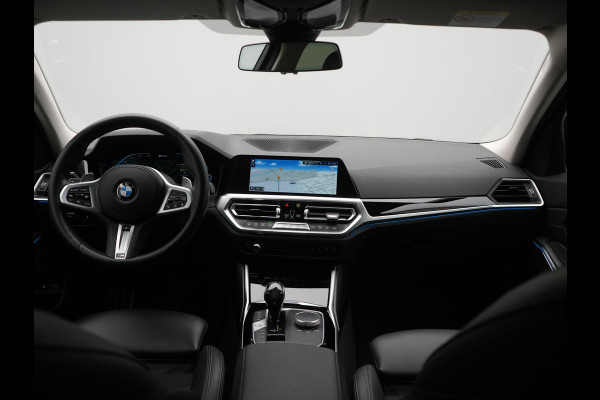 BMW 3 Serie Touring 330e Sport Line PHEV 293pk Dealer O.H. DRAVITGRAU | Trekhaak Af Fabriek | Adaptive Cruise | 360 Camera | Lederen Sportstoelen Memory & Verwarmd | Sfeerverlichting | Stuur Verwarmd | Apple Carplay | Navigatie | DAB | Plug In Hybrid |
