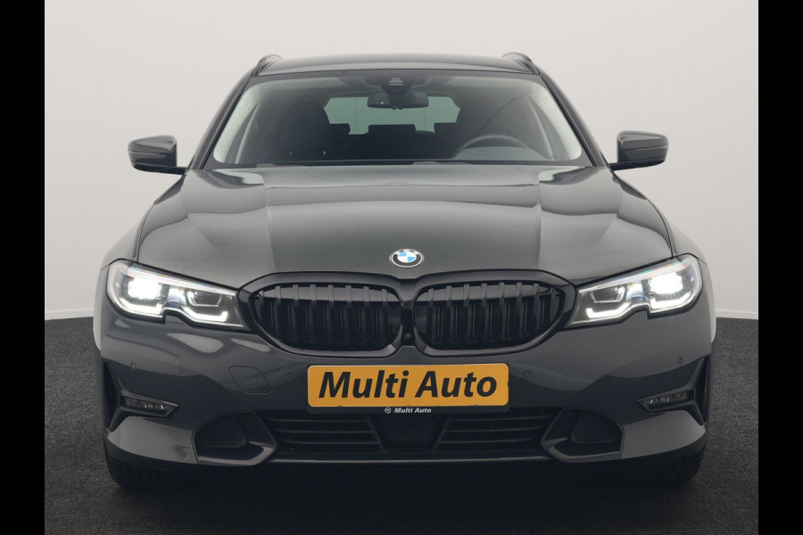 BMW 3 Serie Touring 330e Sport Line PHEV 293pk Dealer O.H. DRAVITGRAU | Trekhaak Af Fabriek | Adaptive Cruise | 360 Camera | Lederen Sportstoelen Memory & Verwarmd | Sfeerverlichting | Stuur Verwarmd | Apple Carplay | Navigatie | DAB | Plug In Hybrid |