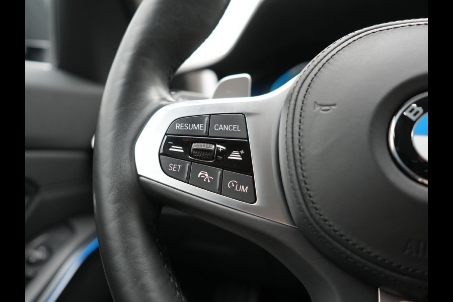 BMW 3 Serie Touring 330e Sport Line PHEV 293pk Dealer O.H. DRAVITGRAU | Trekhaak Af Fabriek | Adaptive Cruise | 360 Camera | Lederen Sportstoelen Memory & Verwarmd | Sfeerverlichting | Stuur Verwarmd | Apple Carplay | Navigatie | DAB | Plug In Hybrid |