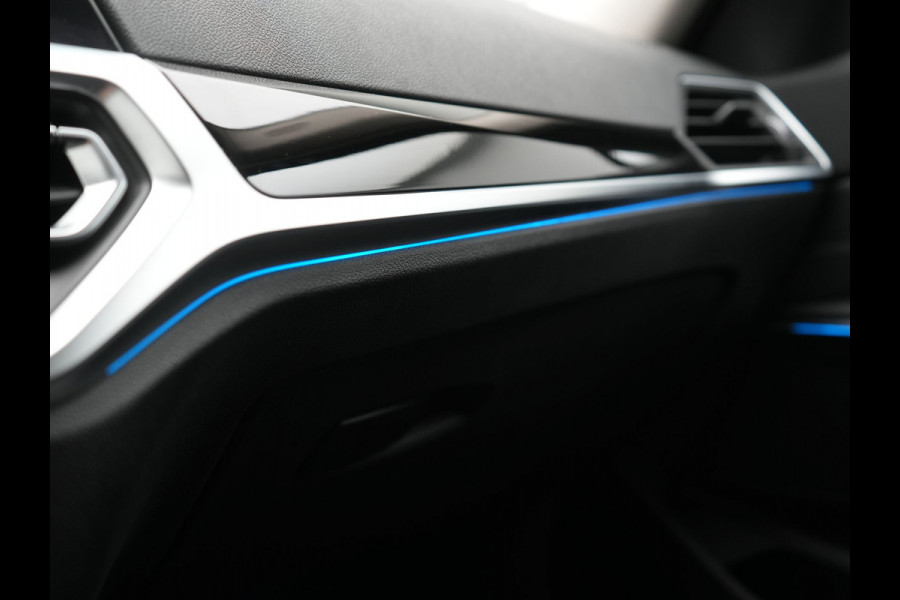 BMW 3 Serie Touring 330e Sport Line PHEV 293pk Dealer O.H. DRAVITGRAU | Trekhaak Af Fabriek | Adaptive Cruise | 360 Camera | Lederen Sportstoelen Memory & Verwarmd | Sfeerverlichting | Stuur Verwarmd | Apple Carplay | Navigatie | DAB | Plug In Hybrid |