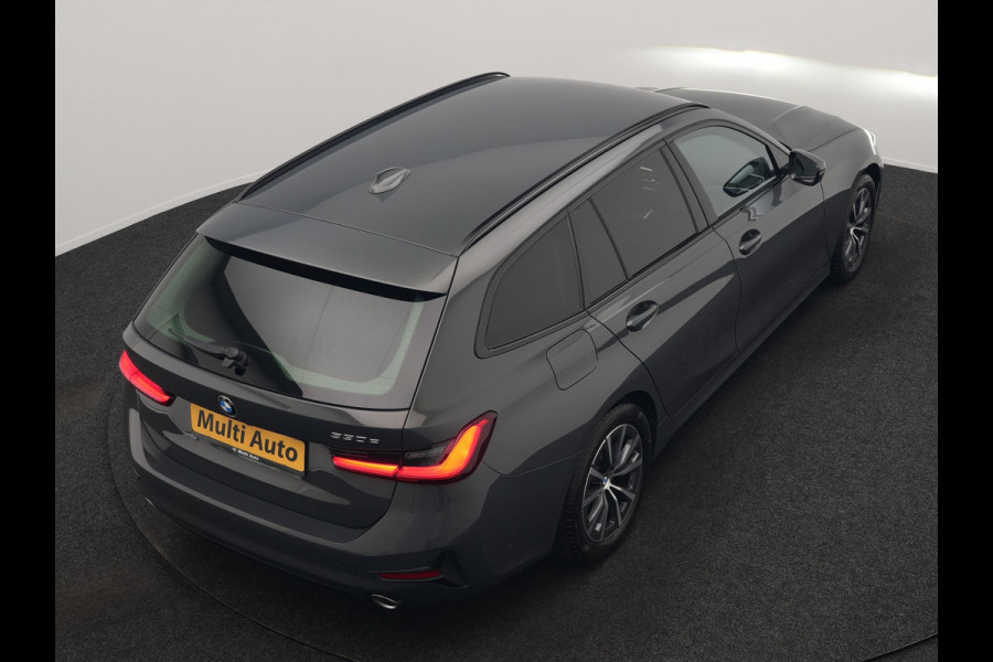 BMW 3 Serie Touring 330e Sport Line PHEV 293pk Dealer O.H. DRAVITGRAU | Trekhaak Af Fabriek | Adaptive Cruise | 360 Camera | Lederen Sportstoelen Memory & Verwarmd | Sfeerverlichting | Stuur Verwarmd | Apple Carplay | Navigatie | DAB | Plug In Hybrid |