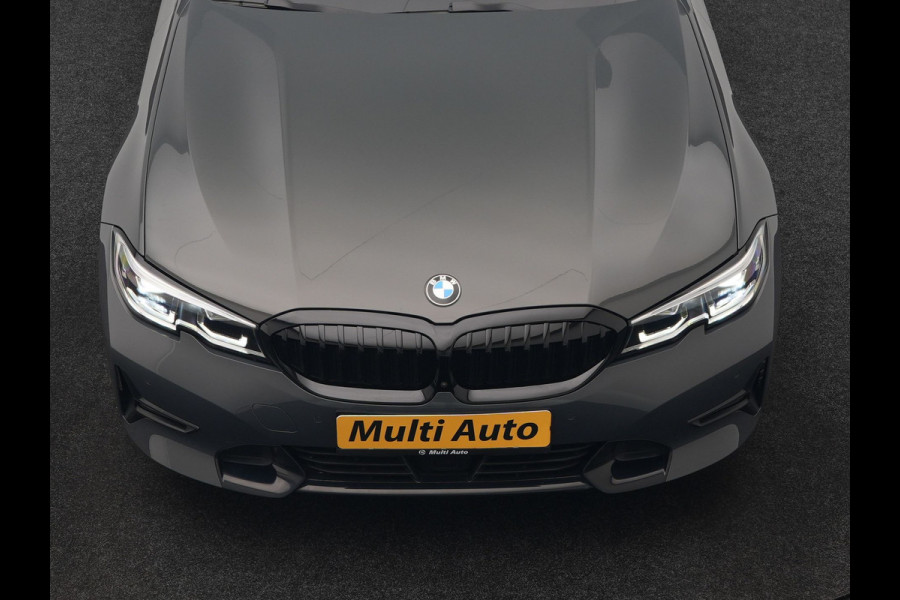 BMW 3 Serie Touring 330e Sport Line PHEV 293pk Dealer O.H. DRAVITGRAU | Trekhaak Af Fabriek | Adaptive Cruise | 360 Camera | Lederen Sportstoelen Memory & Verwarmd | Sfeerverlichting | Stuur Verwarmd | Apple Carplay | Navigatie | DAB | Plug In Hybrid |