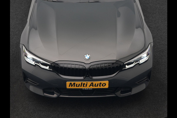BMW 3 Serie Touring 330e Sport Line PHEV 293pk Dealer O.H. DRAVITGRAU | Trekhaak Af Fabriek | Adaptive Cruise | 360 Camera | Lederen Sportstoelen Memory & Verwarmd | Sfeerverlichting | Stuur Verwarmd | Apple Carplay | Navigatie | DAB | Plug In Hybrid |