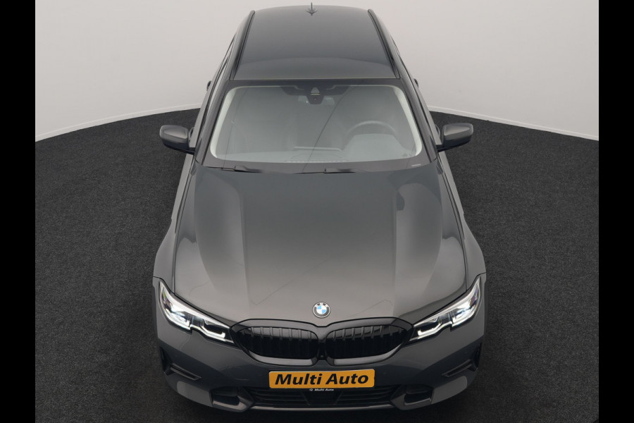 BMW 3 Serie Touring 330e Sport Line PHEV 293pk Dealer O.H. DRAVITGRAU | Trekhaak Af Fabriek | Adaptive Cruise | 360 Camera | Lederen Sportstoelen Memory & Verwarmd | Sfeerverlichting | Stuur Verwarmd | Apple Carplay | Navigatie | DAB | Plug In Hybrid |