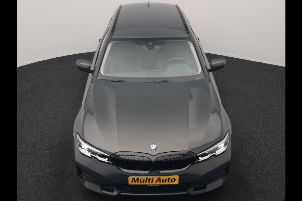 BMW 3 Serie Touring 330e Sport Line PHEV 293pk Dealer O.H. DRAVITGRAU | Trekhaak Af Fabriek | Adaptive Cruise | 360 Camera | Lederen Sportstoelen Memory & Verwarmd | Sfeerverlichting | Stuur Verwarmd | Apple Carplay | Navigatie | DAB | Plug In Hybrid |